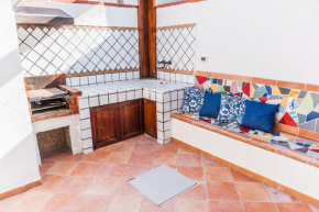 Confortevole appartamento con veranda e barbecue